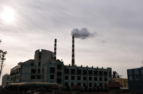 Smoke stacks in the city releasing carbon dioxide